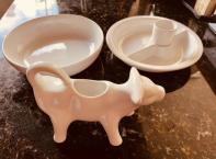 Entertain your friends or give a gift of a set of three items. Porcelain Cow shaped 18x13 cm gravy Dish, a bowl diameter 20 cm and a chip and dip dish 19 cm diameter.
